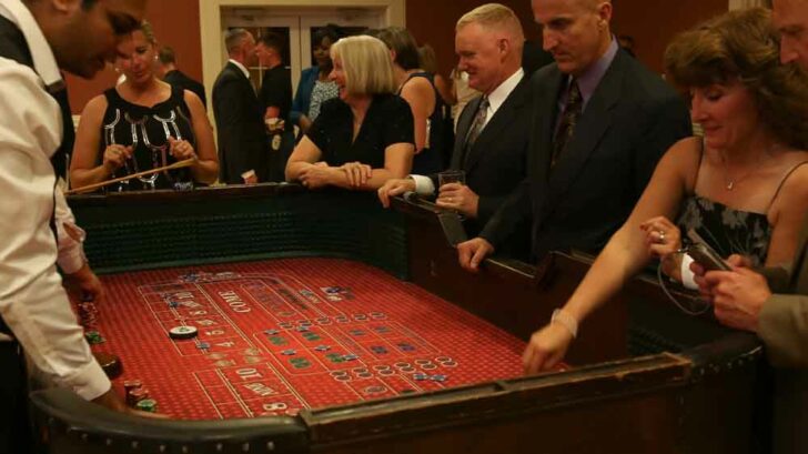 workers at the craps table